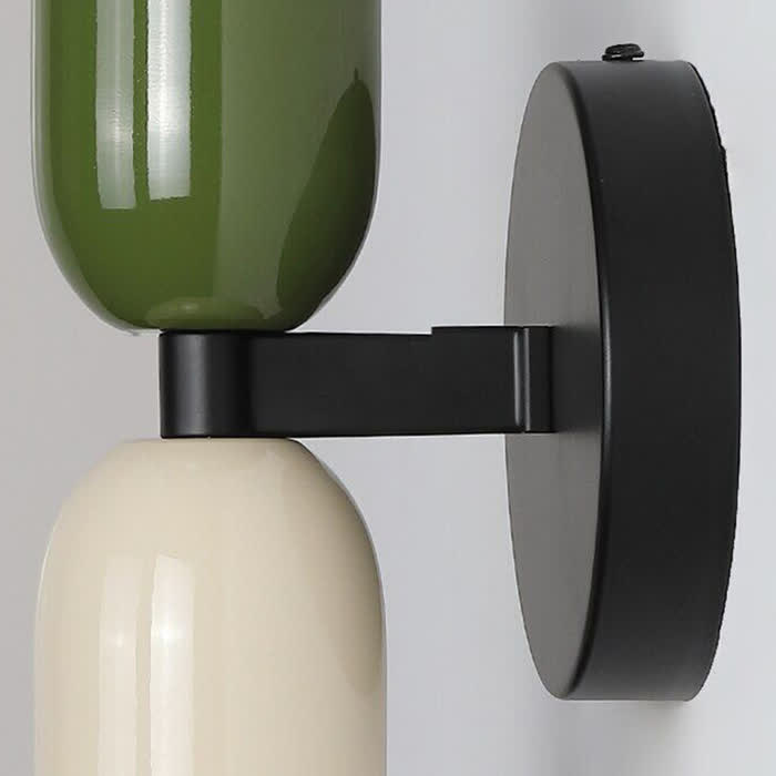Close-up of the metal arm and wall base