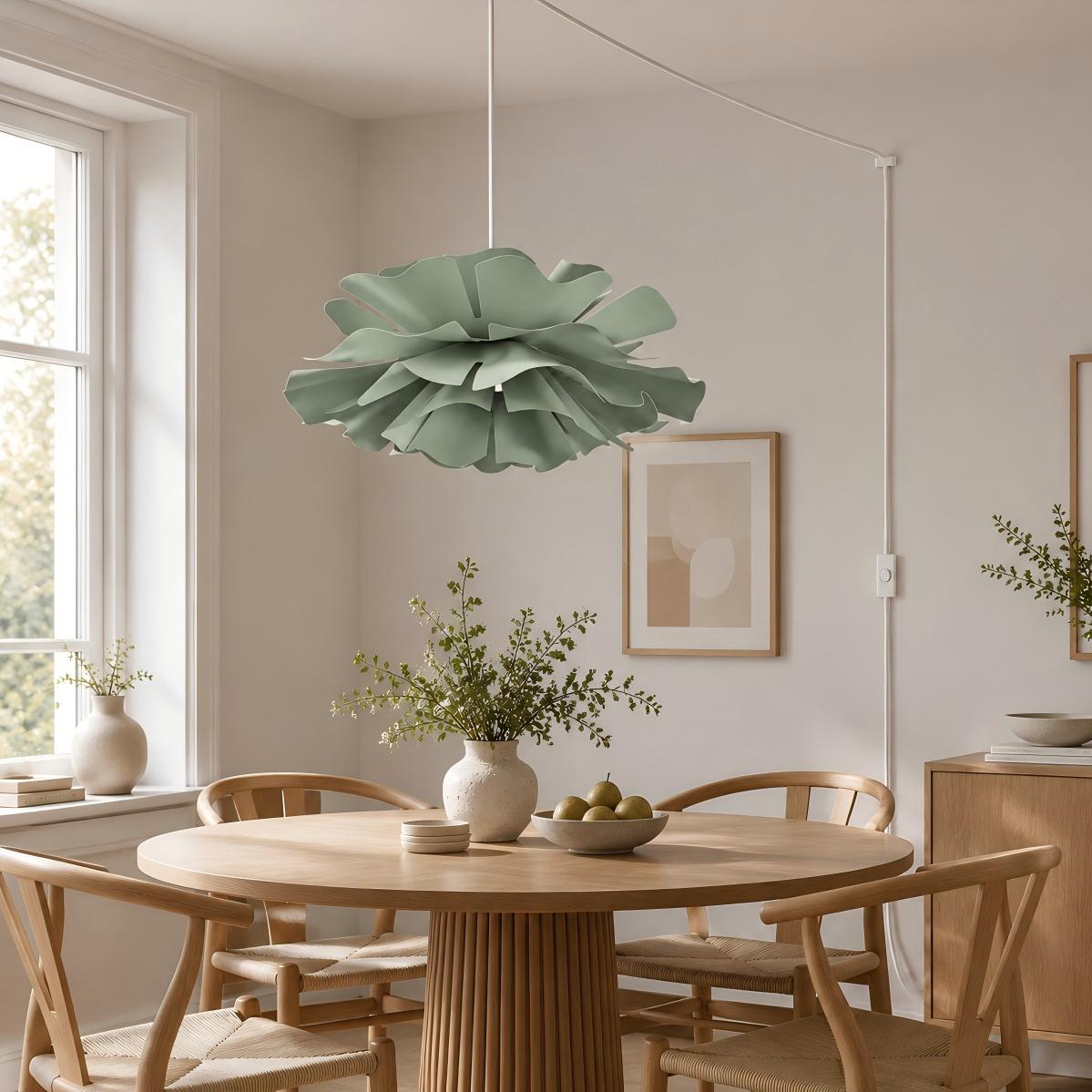 Floral pendant light above a dining table