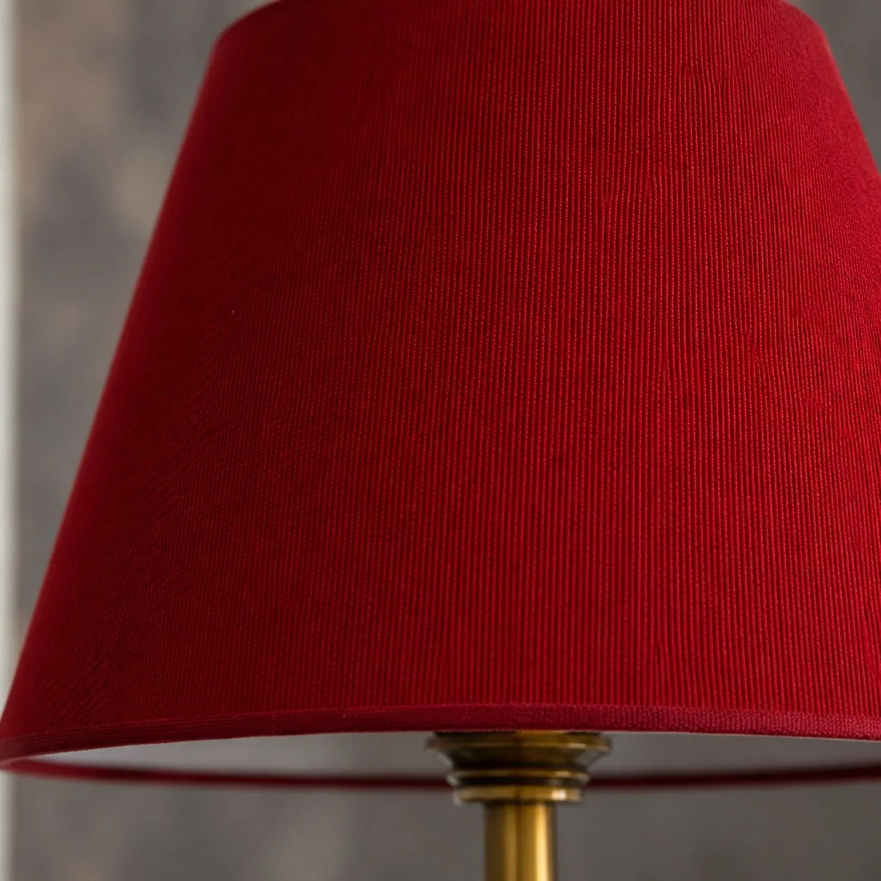 Close view of red fabric lampshade texture