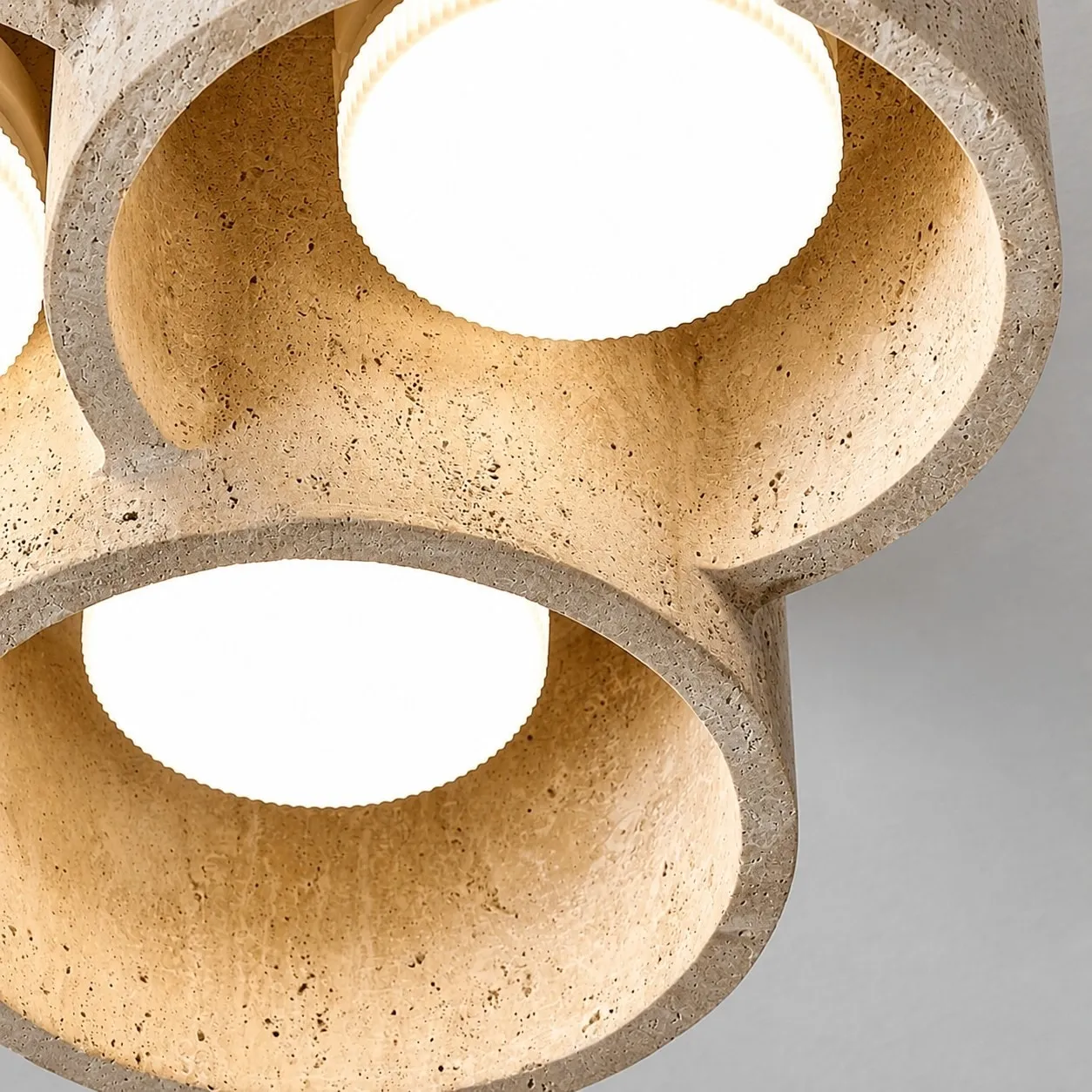 Lit travertine stone shade close detail