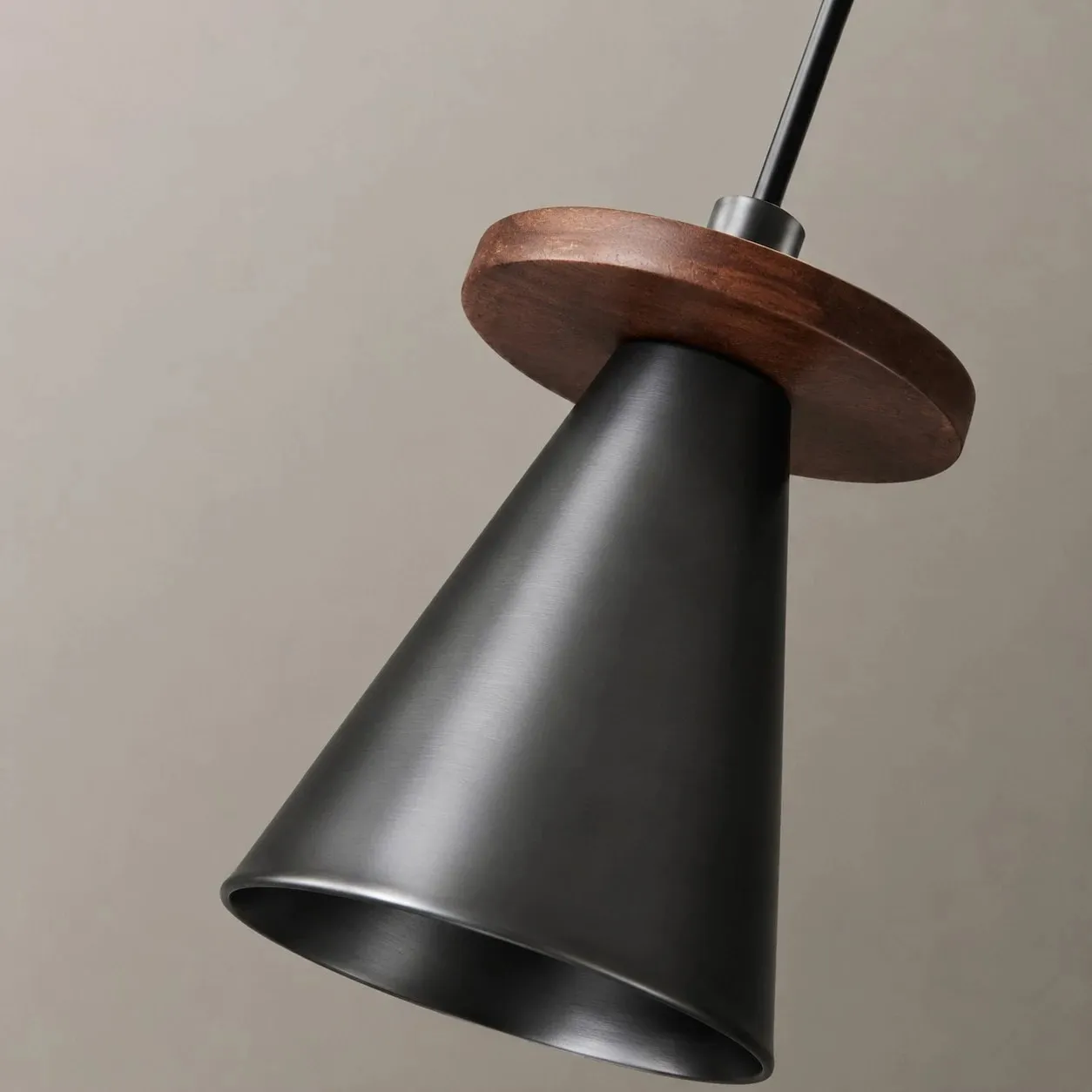 Walnut wood ring and black pendant light body detail