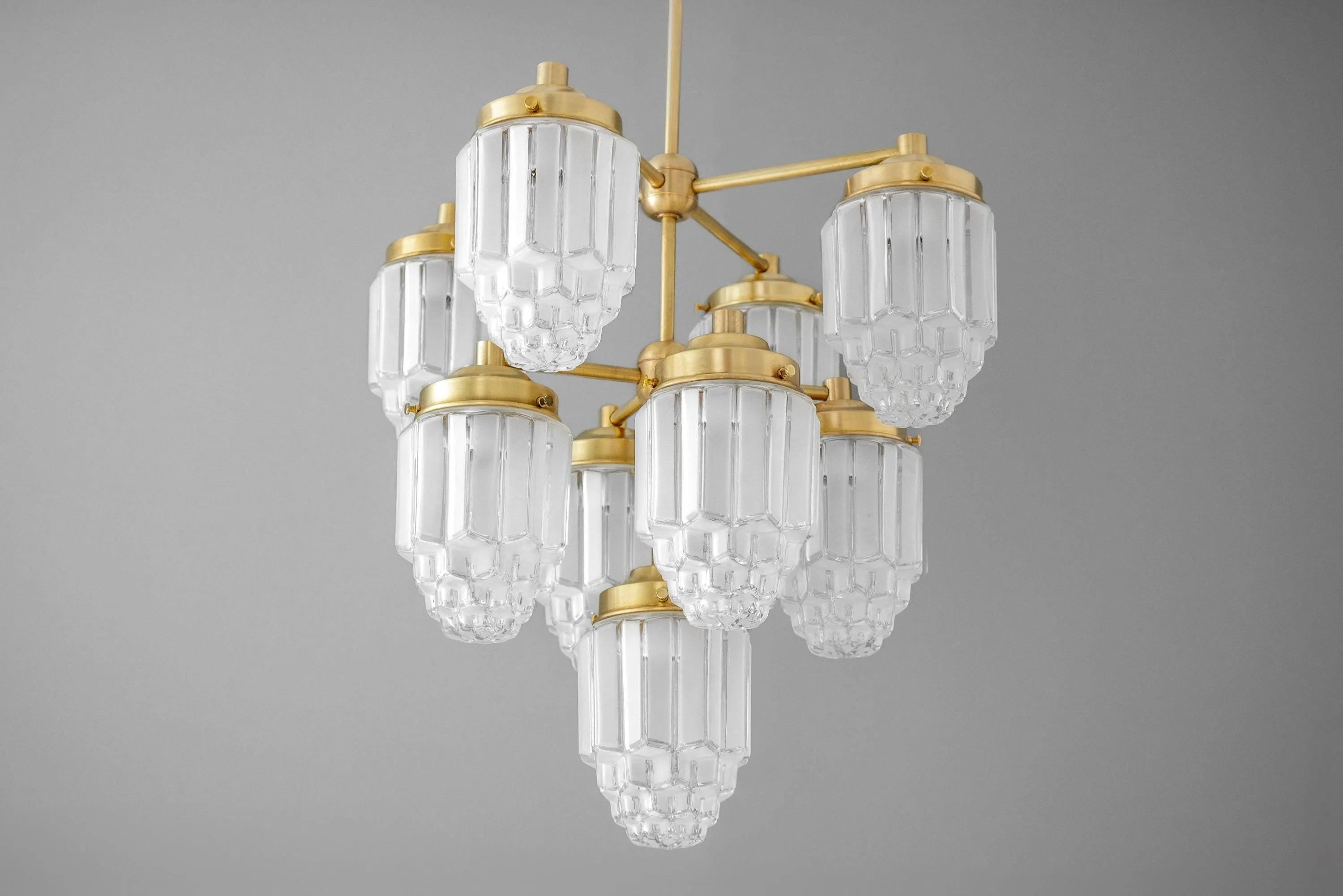 Tierlux Glass Textured Brass Chandelier – Timeless Lighting with Style KL1479