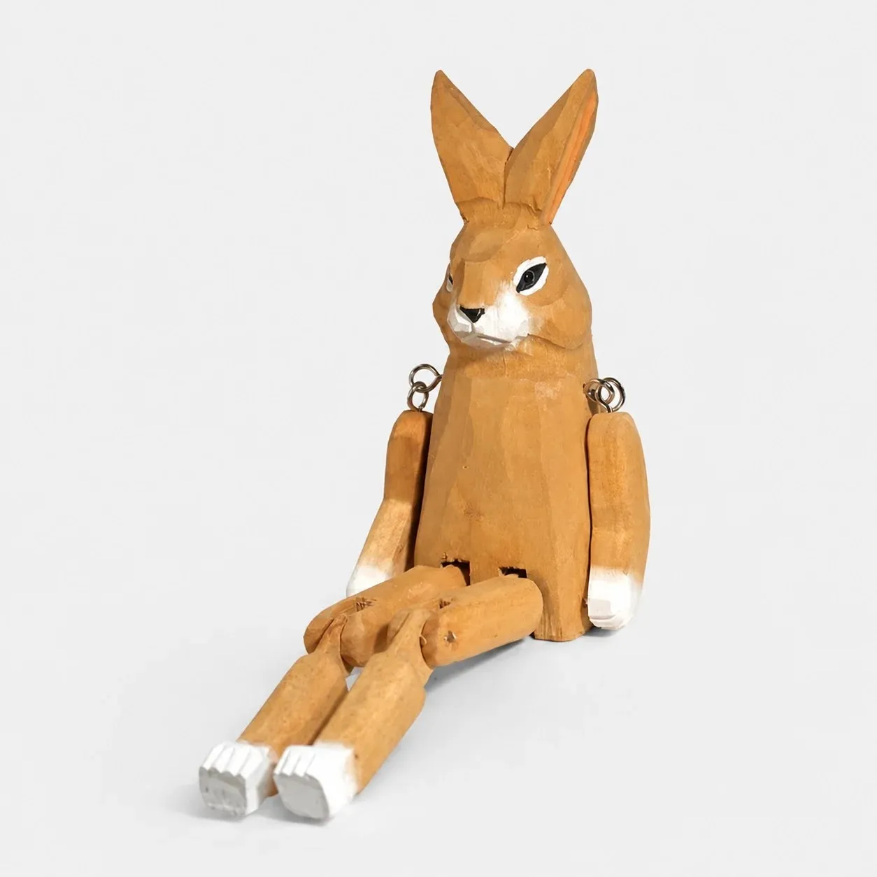 Hand-carved wooden rabbit ornament