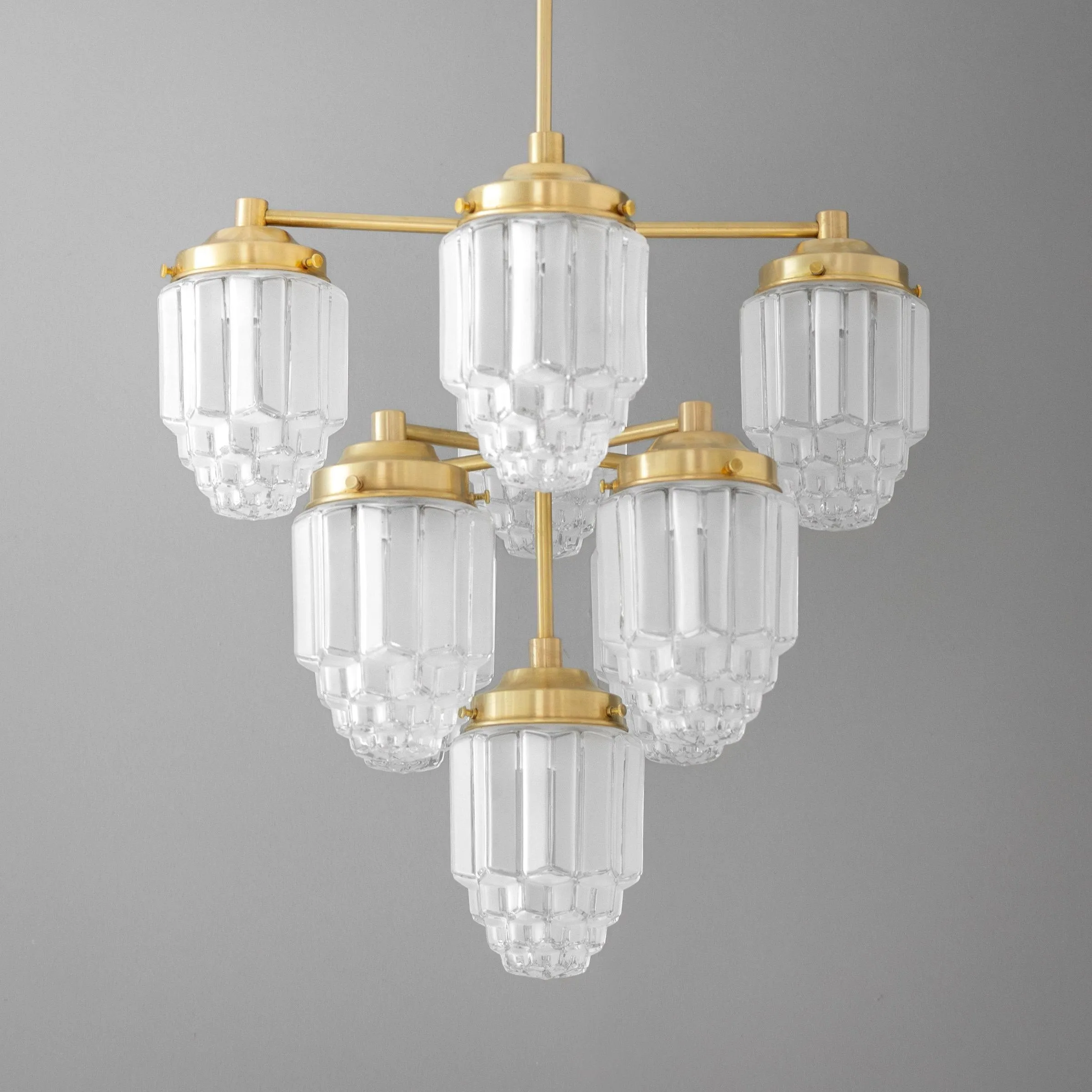 Tierlux Glass Textured Brass Chandelier – Timeless Lighting with Style KL1479