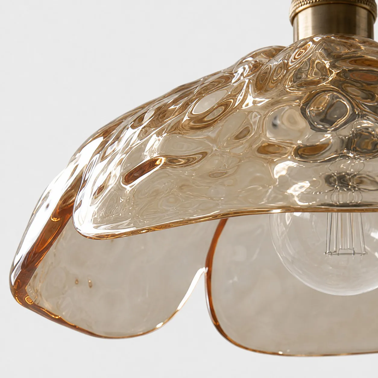 Close-up of clear pressed-glass petal edge