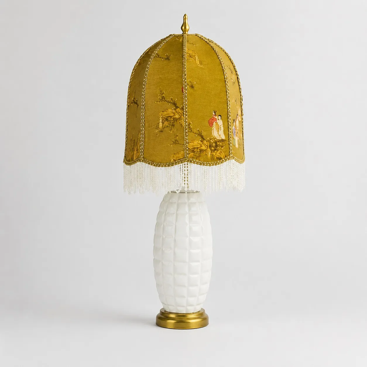 Full view of vintage chinoiserie ceramic table lamp with beaded fringe shade