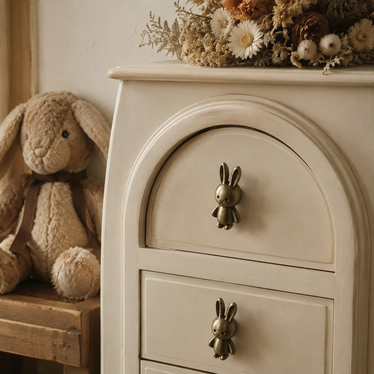 Rabbit cabinet knobs on nursery dresser drawers