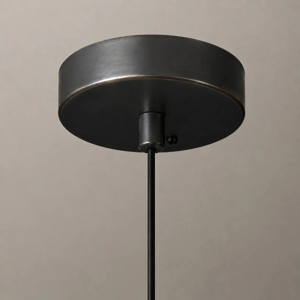 Black pendant shade edge and ceiling canopy detail
